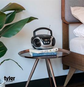 img 1 attached to 🎶 Tyler Portable CD Player Boombox: Compact Home Stereo, AM/FM Radio, AC & Battery Compatible, Aux Input & Headphone Jack, Lightweight Silver Design