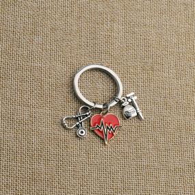 img 1 attached to 💉 Nurse Graduation Gift: Heartbeat Keychain - AKTAP Nurse Gifts Nurse Charm Key Chain