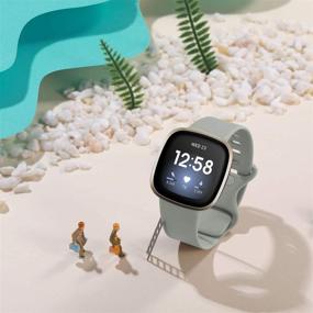 img 1 attached to 🌈 GEAK Совместимый с браслетами Fitbit Versa 3/Sense, 3 шт. Мягкие водонепроницаемые запасные ремешки для запястья для умных часов Fitbit Versa 3/Sense - Большой размер, черный/белый/серый.