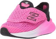 new balance champagne metallic girls' running shoes for athletic performance logo
