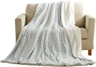 tache faux blankets snowy 90x90 logo