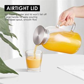 img 2 attached to 🥛 60oz Glass Water Pitcher with Airtight Lid, Handle & Scale Line - ZDZDZ Glass Pitcher for Iced Tea, Milk, Coffee, Cold/Hot Beverages