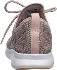 img 2 attached to 👟 New Balance Women's Athletic Shoes - FuelCore Champagne Metallic