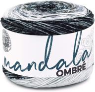 lion brand yarn mandala ombre" translates to "lion brand yarn мандала омбре" in russian. логотип
