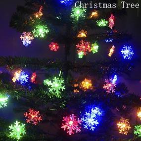 img 2 attached to 🎄 31ft 50LEDs Waterproof Snowflake Solar Christmas Lights for Parties, Garden, Outdoor, Holiday, Patio, Christmas Tree Decoration - Mankinlu Multicolor Snowflake String Lights