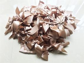 img 1 attached to Pack of 100 Satin Bowknot Gold Large Cheer Bows - DIY Craft Ribbon Bow Appliques for Gift Wrapping, Sewing, Scrapbooking - Wedding Candy Party Decoration in Champagne Color