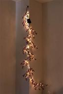 peiduo 6ft christmas artificial garland with 88 warm white lights: clearance sale, battery operated with timer for holiday indoor wall decoration logo