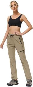 img 1 attached to Butrends Women's Hiking Cargo Pants: Quick Dry Capris with Zipper Pockets for Outdoor Adventures