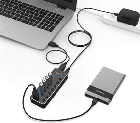 img 2 attached to RSHTECH 7-Port USB 3.0 Hub Expander with Universal 5V AC Adapter, Individual On/Off Switches, and Aluminum Data Port - USB Splitter for Laptop and PC (Black)