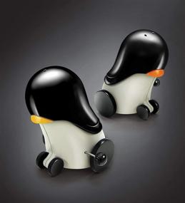 img 1 attached to 🐧 Simposh Rolling Penguins: Interactive Wind-Up Salt & Pepper Shakers"