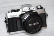 📷 комплект зеркального фотоаппарата minolta xg-m: объектив 50 мм f/2.0, ручная фокусировка и многое другое! логотип