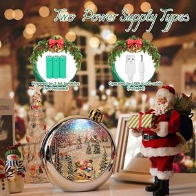 img 2 attached to 🎅 Mesmerizing Christmas Snow Globe Lantern: Semi-Round Silver Tablepiece with Swirling Glitter, Musical Snow Globes, and Glittering Christmas Snowglobe Decoration – Battery and USB Operated