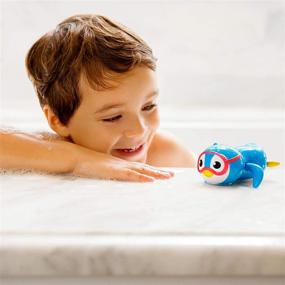 img 3 attached to Munchkin Essentials: Fun and 🐧 Functional Wind-Up Swimming Penguin for Toddlers