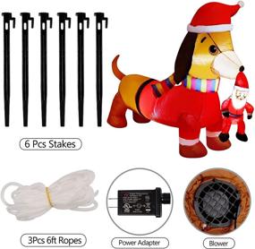 img 1 attached to 🎅 DR.DUDU 5 FT Christmas Inflatable Dachshund Dog Holding Santa Claus, Blow up Wiener Puppy with LED Lights, Ideal Xmas Outdoor Decor for Yard, Garden, Lawn, Holiday Party