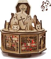🎃 enchanting melodies: wood trick halloween wooden music box logo