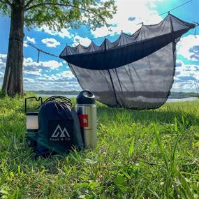 img 2 attached to 🪲 Peak & Co. Hammock Bug & Mosquito Net - 12' with Water Resistant Bag & Guyline Adjusters. Fits All Single/Double Camping Hammocks. Compact. Lightweight. Fast/Easy Setup. Dual Sides Zippers. Protect Yourself from Bugs and Mosquitoes during Outdoor Adventures!