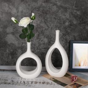 img 1 attached to 🏺 Modern Decorative Ceramic Vase Set - LIBWYS White Hollow Oval Vases for Living Room, Kitchen, Office, Home, Table - Set of 2 (12.2'' and 9.4'' High) - Geometric Flower Vases
