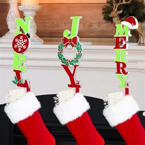 img 4 attached to 🎅 Enhance your Christmas Decor with RUODON 3-Piece Metal Stocking Holders – Joy, Merry, Noel Fireplace Hooks
