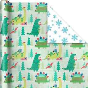 img 2 attached to 🐨 Colorful Reversible Christmas Wrapping Paper for Kids with Dinosaurs, Koalas, Polar Bears, Penguins, Camels, Zebras, Stripes - 3 Rolls (120 sq. ft. ttl) - Hallmark Trendy Collection