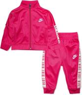 👶 adorable nike baby girls' 2-piece tracksuit: perfect fit for active little ones logo