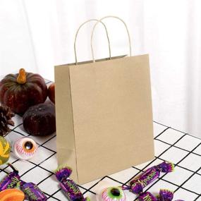 img 2 attached to 🎁 100Pcs Kraft Paper Gift Bags Bulk with Handles, 5.25" x 3.75" x 8", Candy Paper Party Treat Bags - Gift Bag Decorations