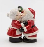 🎅 multicolored cosmos gifts kissing santa couple salt and pepper set - enjoy festive season spice! logo