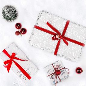 img 1 attached to 🎁 RUSPEPA Рождественская упаковочная бумага: белая с серебряным блестящим узором - набор из 4 рулонов, каждый размером 30 дюймов x 10 футов - идеально подходит для совершенной упаковки рождественских подарков.