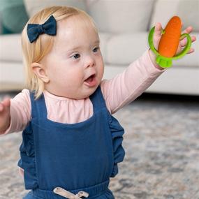 img 2 attached to Infantino Lil' Nibble Teethers Carrot: Soft-Textured Silicone Teether for Effective Sensory Exploration and Teething Relief - with Easy-to-Hold Handles