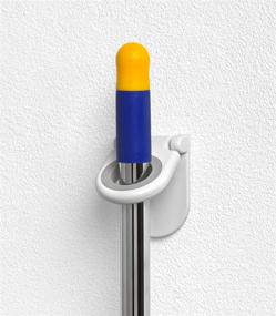 img 2 attached to 🧹 Spectrum Diversified Mop and Broom Holder and Organizer - Utility Closet Storage and Organization for Cleaning Supplies - Garage Storage for Brooms and Mops - White