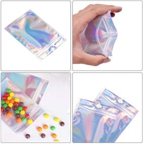 img 2 attached to 🛍️ 100PCS Resealable Smell Proof Bags - Malastar 2x3 inch (Inner Size 1.6x1.8″) Foil Pouch Baggies, Holographic Mylar Ziplock Clear Bag Packaging for Jewelry, Lip Gloss, Candy, Food Storage, Products, Eyelash