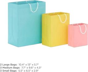 img 2 attached to 🎁 Assorted Recyclable Gift Bags (8 Bags: 3 Small 6&#34;, 3 Medium 9&#34;, 2 Large 13&#34;) in Pastel Blue, Pink, Yellow, Purple, Orange, and Green for Birthdays, Easter, Baby Gifts, and Bridal Showers - Hallmark