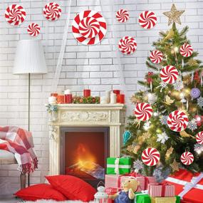 img 1 attached to Blulu 18 Pieces Peppermint shaped Candy Wall Cut Outs for Christmas Party Home Decoration Supplies