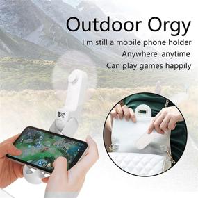 img 3 attached to RIIEYOCA Handheld Small Fan with Phone Holder - Portable Foldable Mini Fan, USB Rechargeable Pocket Fan with 2000mAh Battery, Long Lasting Performance Up to 21 Hours, Ideal for Shopping, Travel, Outdoor Activities, Camping (White)