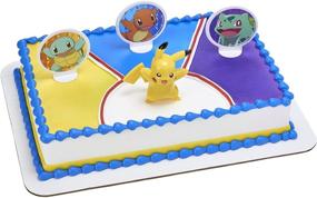 img 4 attached to 🎂 Оригинальная версия набора для украшения торта Decopac Pokemon Light Up Pikachu - упаковка из 4 штук, 2,7" х 2,2" х 0,95