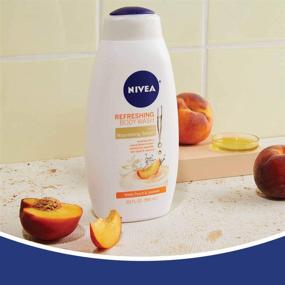 img 2 attached to NIVEA Освежающий белоснежный персик Душевой гель с ухаживающим серумом - аромат жасмина, 20 жидких унций.