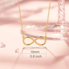 img 1 attached to 🎁 Кулон Carleen, выполненный из настоящего золота 14K с изображением бесконечности – элегантное и изящное ювелирное украшение в подарок женщинам, девочкам и подросткам – поставляется с золотой цепочкой 16+2 дюйма – размеры 19x8 мм.