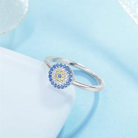 img 1 attached to Stunning 8mm Round Blue Evil Eye Band Ring in Sterling Silver 925 with Sparkling Cubic Zirconia, Size 6-8