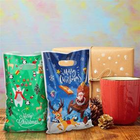 img 2 attached to 🎄 120 Christmas Plastic Bags with Snowman, Moose, and Christmas Tree Designs - Perfect for Christmas Party Favors and Candy