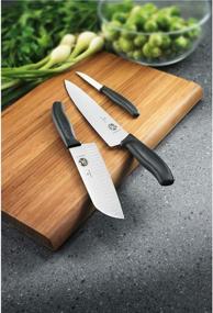 img 2 attached to Викторинокс 6.7733 Swiss Classic Paring Knife: Черный 4-дюймовый нож с зубчатым торцом и округлым наконечником - универсальный режущий инструмент.