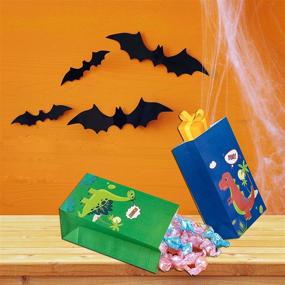 img 1 attached to 🦖 Dinosaur Goodie Bags for Halloween Decorations: Perfect Gifts for 3 Year Old Boys and Dinosaur Themed Birthday Parties, Halloween Party Favor Bags for Kids 3-5 and 4-8 (18PCS)