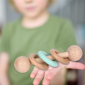 img 3 attached to 🌿 Organic Wooden Baby Toys: Rattle, Grasping Bells, Teething & Crawling Toys - Ideal Newborn Gifts (Green)