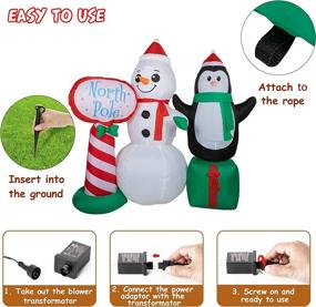 img 1 attached to HOOJO 7.5 FT Outdoor Inflatable Snowman with Penguin Guidepost: Colorful LED Lights for Holiday Decor in Lawn, Yard, Garden