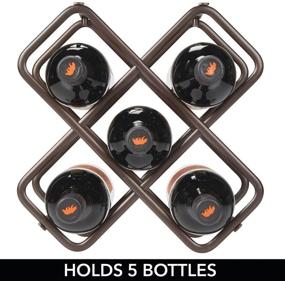 img 1 attached to mDesign Bronze Metal Wine Rack - Stylish Countertop Organizer for Kitchen, Pantry, Fridge - Holds 5 Bottles of Wine, Beer, Pop/Soda, Water Bottles - 3 Levels Storage Solution