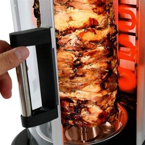img 3 attached to 🍗 NutriChef Countertop Vertical Rotating Oven - Rotisserie Shawarma Machine, Kebob Machine with Heat Resistant Door, Stain Resistant & Energy Efficient - Includes Kebob Rack and 7 Skewers (PKRTVG34)