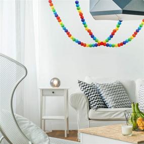 img 2 attached to 🎪 Wool Felt Ball Garland - 12 Feet Glaciart One Pom Pom Garland with 40 Balls in 6 Rainbow Colors - Perfect for Pom Pom Decorations, Nursery Decor, Bunting, Birthday Parties, Carnivals, and Photo Props - Circus-Themed
