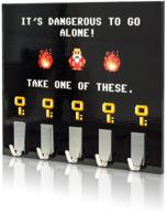🔑 geeky home and office decor wall-mounted key holder - getdigital dangerous to go alone key rack with 5 metal hooks - dimensions 21 x 16 cm logo