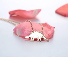 img 3 attached to YOOE Small Dinosaur Pendant Necklace - Gold and Silver Stegosaurus T Rex Necklace for Boys and Girls - Animal Jewelry Birthday Gift