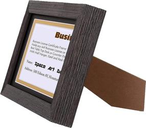 img 2 attached to 🖼️ Space Art Deco Brown Frame for 4x9 Business License/Certificates: Elegant D-Shaped Hangers & Easel Stand Included (5x10 Frame with Black Over Gold Double Mat, Set of 1)