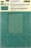 olfa 35x70 inch connecting grid rotary cutting mat set - self healing double sided cutting mat with grid for fabric & sewing, designed for use with rotary cutters (green) logo