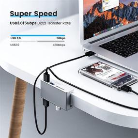 img 2 attached to ORICO USB 3.0 Hub with 3-in-1 Desk Mount Clamp: SD Card Reader, 5Gbps Speed, Multi-Port Adapter, 2-Port USB Splitter for Laptop, PC, Camera, Keyboard, and More - Sleek Silver Design